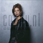 19-04-2002 Nadja Hupscher at studio in Amsterdam, April 19, 2002.

[keywords]Posed, Half Length, Eye Contact[/keywords]